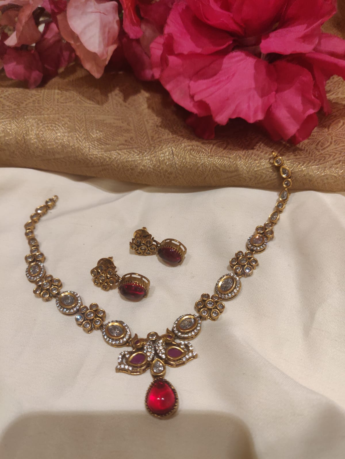 Ornate Antique Finish Bloodred Stone Pendant Peacock Design AD Necklace