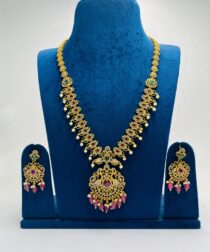 Mesmerizing Floral AD Design With Peacock Pendant Red Beads Long Necklace