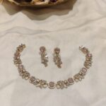 Scintillating Leafs Necklace With Pink AD Stone