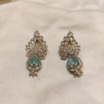 Scintillating Crystal Leafs Peacock Earring With SkyBlue AD