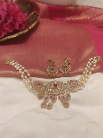 Opulent White Pearls Necklace With Red Floral AD Stone