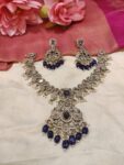 Whimsical Peacock Crystal Neckalce With Blue Ad stone