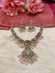 Trendsetting Antique Finish Peacock Floral Pink Necklace