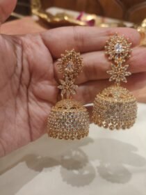 Poised Golden  Jhumka With Crystal Floral design