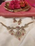 Opulent Chain Floral Design With Red AD Stone  White Beads