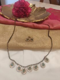 Timeless Mangalsutra With Green AD Stone