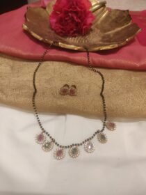 Timeless Mangalsutra With Green Red AD Stone