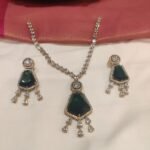 Mesmerizing Crystal Neckalce With Green Ad Stone