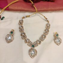 Unique Crystal Kundan Leafs Necklace with Green AD Stone