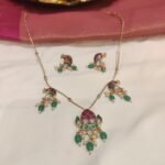 Lustrous Golden Chain With Floral Peacock Pendant Light Green White Beads
