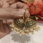 Scintillating  Green AD Stone Jhumka With White Beads