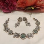 Inimitable CZ Leafs Necklace With light Green AD Stone