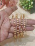Lustrous Crystal Ad Star Bangles With Red AD Stone Set of 4