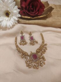 Mesmerizing Red Ad Stone Necklace With White And Golden Beads