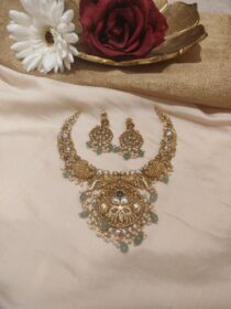 Dazzling Golden Peacock Necklace With Lightgreen Beads
