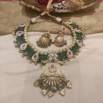 Refined green moti with golden boarder bridal necklace