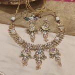 Dazzling golden big stone and golden moti bridal necklace