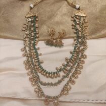 Opulent bridal green golden moti necklace
