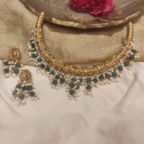 Posh bridal peral and green moti golden  choker necklace