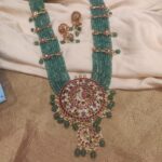 Ornate green stone moti with golden big multi collor pendant