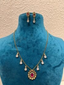 Mesmerizing ruby and diamond pendant golden chain