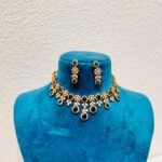 Artisanal brown stone droplet with ad diamond leaf choker