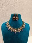 Glamorous diamond and purple moti necklace