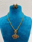 Iconic bridal necklace  with magestic pendant with golden moti necklace