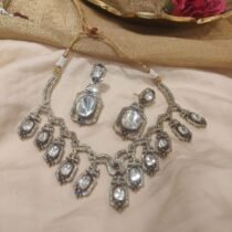 Jubilant Ethereal mirror with ad stone necklace red moti