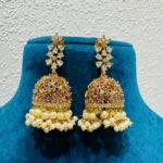Regal Scintillating jelly fish design with purple stone and golden moti jhumka earring