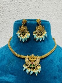 Trendsetting  Whimisical golden half moon with pearls and sky bids golden necklace