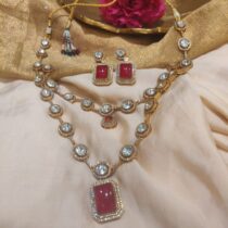 Dazzling red blood stone with ad stone golden necklace