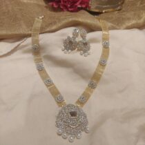Sparkling Sparkling purple STONE AND AD STONE WITH PEARLS GOLDEN NECKLACE