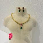 Alluring Golden Necklace With Green Red Ad Stone