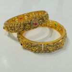 Radiant Peacock Nakshi Red Green Ad Stone Bangle Set of 2