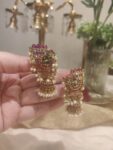 Lustrous Crystal Ruby AD Peacock Jhumka