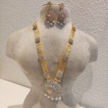 Mesmerizing CZ Golden Necklace With Pink Ad Stone