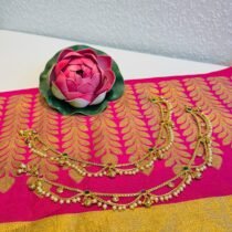 Regal Layered White Pearl Payal with Red Green Beads