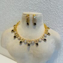 Ornate Crysatl AD Stone Purple Necklace