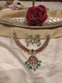 Trendsetting Ruby Stone Necklace With Gtreen Stone