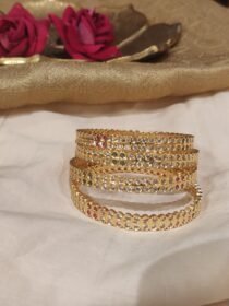Glamorous golden AD Stone Bangle Set of 4