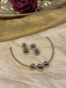 Resplendent Golden Pipe Necklace with Purple AD Stone