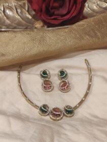 Unique Golden Pipe Necklace with Ruby Green AD Stone