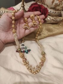 Lustrous White Pearls Red Green AD Stone Chain