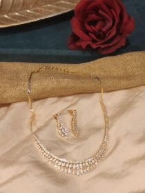 Trendsetting Golden Droplet Ncecklace with CZ Stones