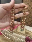 Radiant Ruby Stone Long Jhumka With Light Green Beads