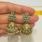 Alluring Floral Mint Stone Jhumka With White Beads