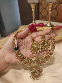 Lustrous Coral Stone Temple Choker With Green Beads